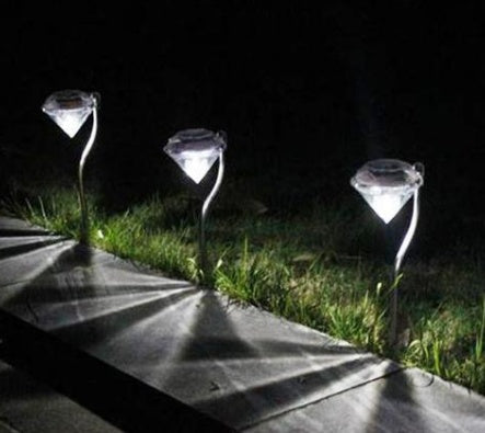 Solar powered garden diamond light with faceted design for outdoor landscape decoration