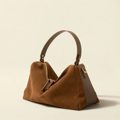 High-grade versatile cowhide handbag by My Store, showing its structured design and natural leather texture