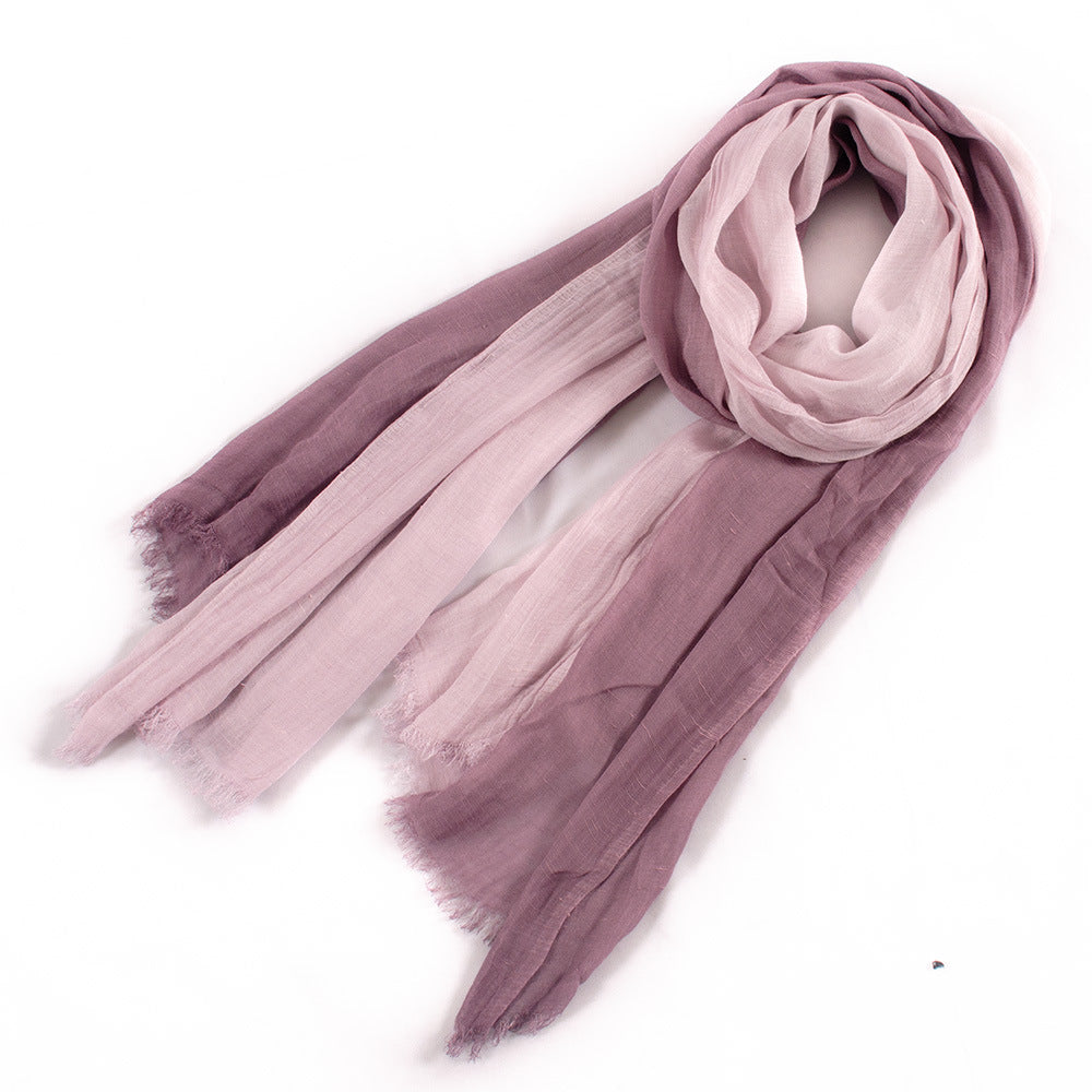 Large soft warm cotton scarf with tassel edges, shown in a simple product view