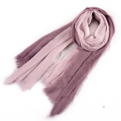 Large soft warm cotton scarf with tassel edges, shown in a simple product view