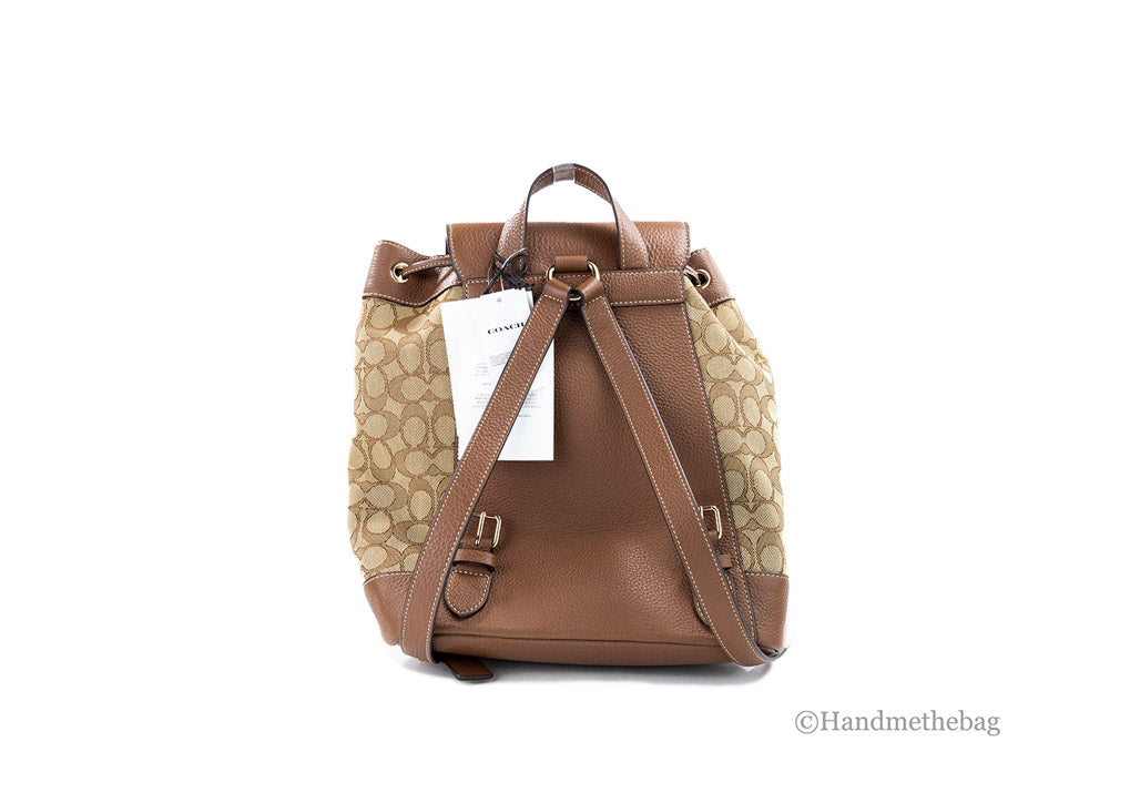 Coach Dempsey Khaki Saddle Signature Jacquard Canvas Patch Backpack with leather accents and adjustable straps.