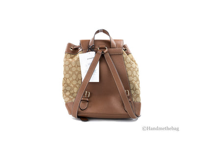 Coach Dempsey Khaki Saddle Signature Jacquard Canvas Patch Backpack with leather accents and adjustable straps.