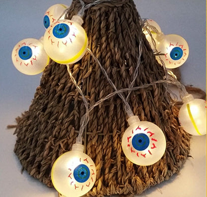Halloween pumpkin LED string lights lantern decoration with glowing pumpkin shapes on a dark background