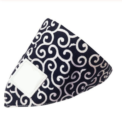 Dog triangular bandage folded for pet first aid, blue fabric with visible tie ends