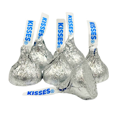 Hershey's Kisses milk chocolate candies in silver foil wrapping, displayed in a bulk value bag, from Candy In Bulk.