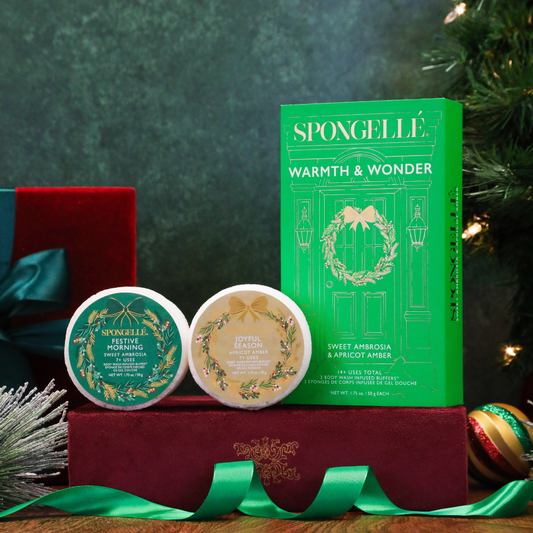 Spongellé Warmth & Wonder Holiday Wreath body wash infused buffer with festive holiday scent and holiday-themed packaging.