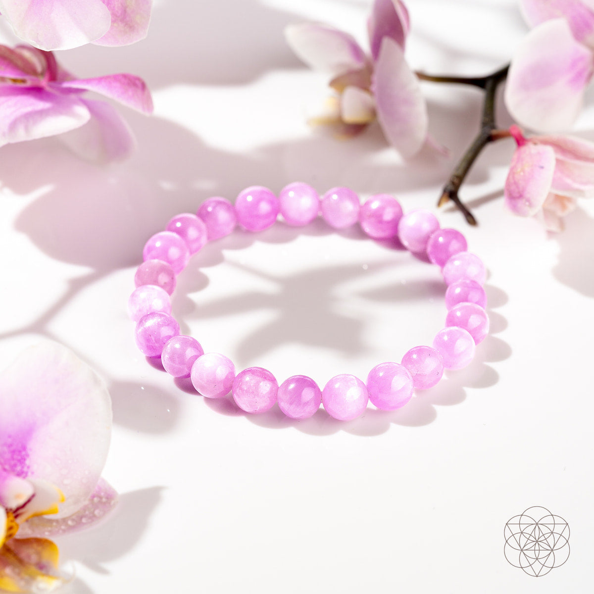 Pink Kunzite bracelet from Conscious Items featuring heart-shaped stones, elegant jewelry piece with vibrant pink gemstones.