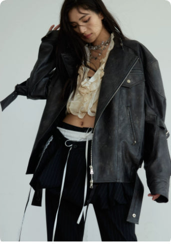 Dark Rock genderless futuristic motorcycle vintage jacket in black leather with structured seams and metal hardware