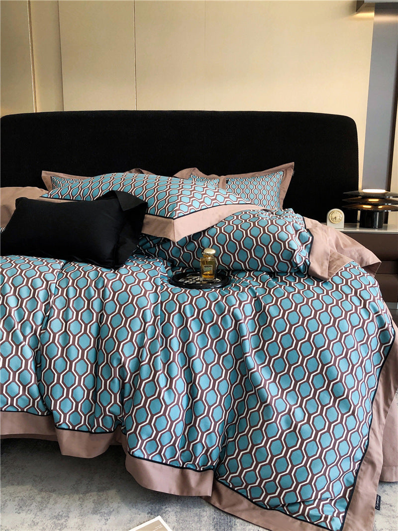 Long-staple cotton printed four-piece bedding set in soft cotton fabric, featuring a coordinating patterned design