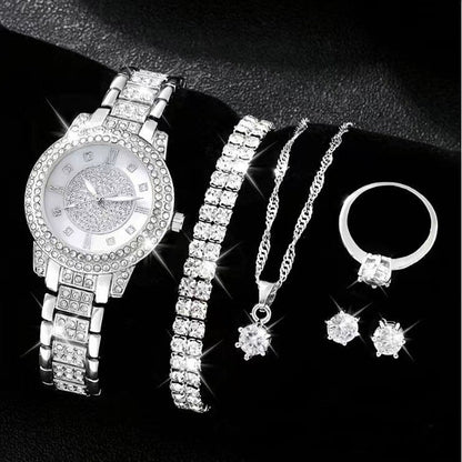 Women's Cornucopia diamond-embedded watch set with coordinating accessories, viewed on a clean background