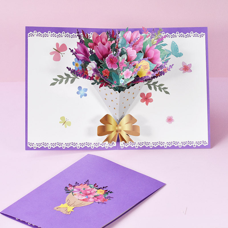 Three-dimensional hand-carved paper blessing greeting card with intricate layered design