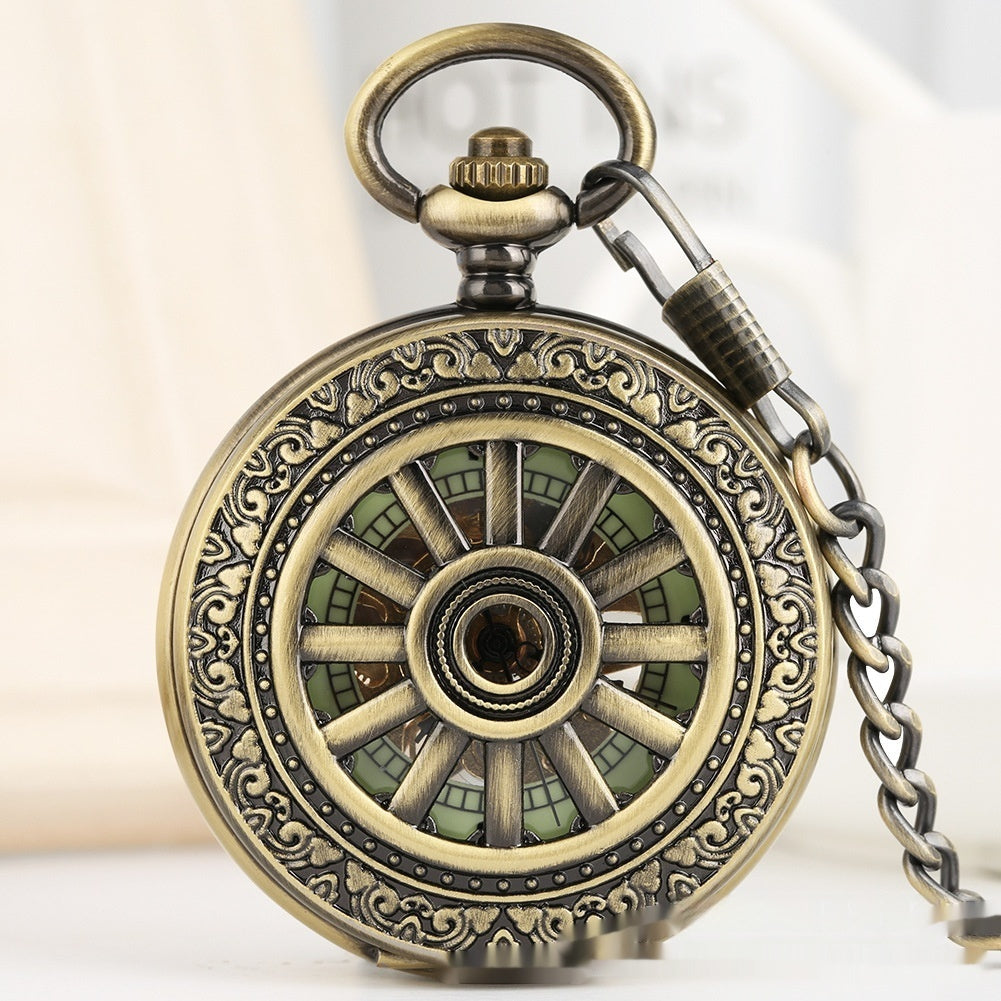 Openwork carved floral Roman-style pocket watch with visible Roman numerals and intricate metal detailing