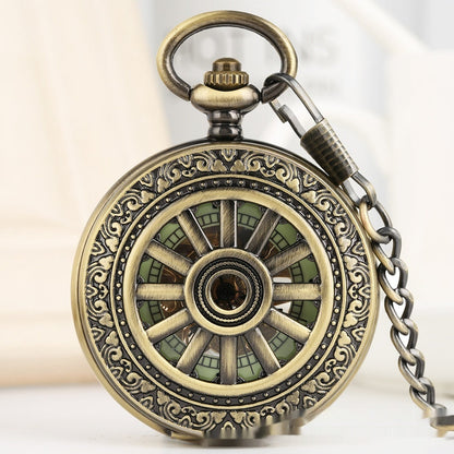 Openwork carved floral Roman-style pocket watch with visible Roman numerals and intricate metal detailing