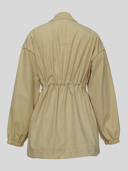 Women's drawstring waist mid-length trench coat in a classic tailored style