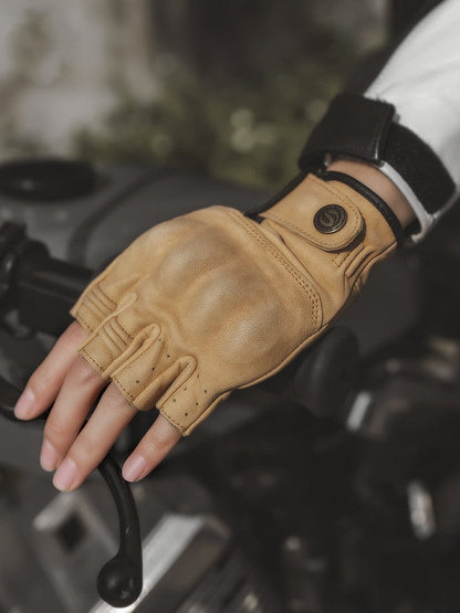 Vintage leather half-finger motorcycle gloves with adjustable wrist straps and exposed fingertips