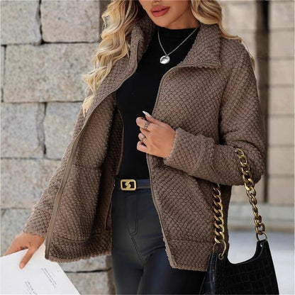 Women's padded fleece-lined zip-up jacket with pockets and lapel collar, front view