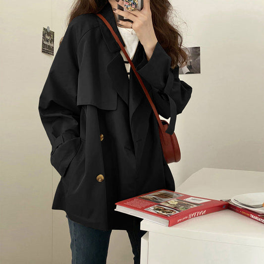 Khaki women’s short thin trench coat in British style with classic double-breasted design