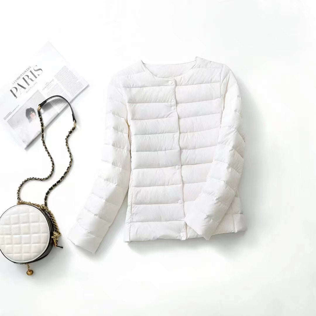 Women’s lightweight white duck down jacket with quilted design and zip front