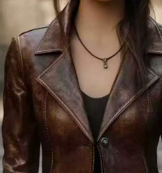 Retro biker leather jacket top in chic black design with classic lapels and zip details