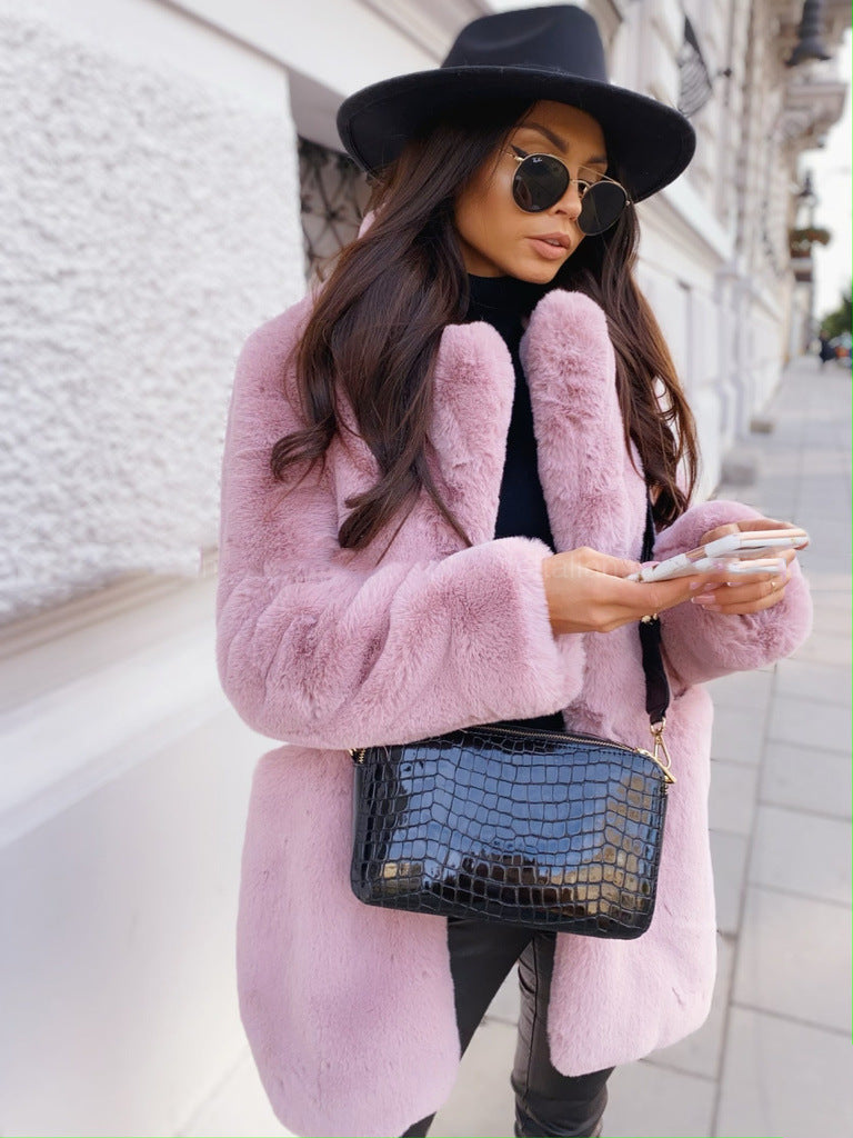 Women's long sleeve lapel faux fur coat in a solid color, front view