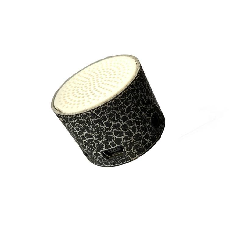 Mini wireless Bluetooth speakers by My Store on a plain background