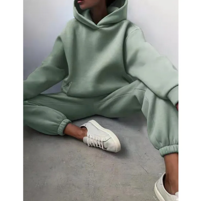 Women's hooded tracksuit by BACKUPMYFILESNOW® featuring a zip-up jacket and matching sweatpants in a casual, comfortable fit.