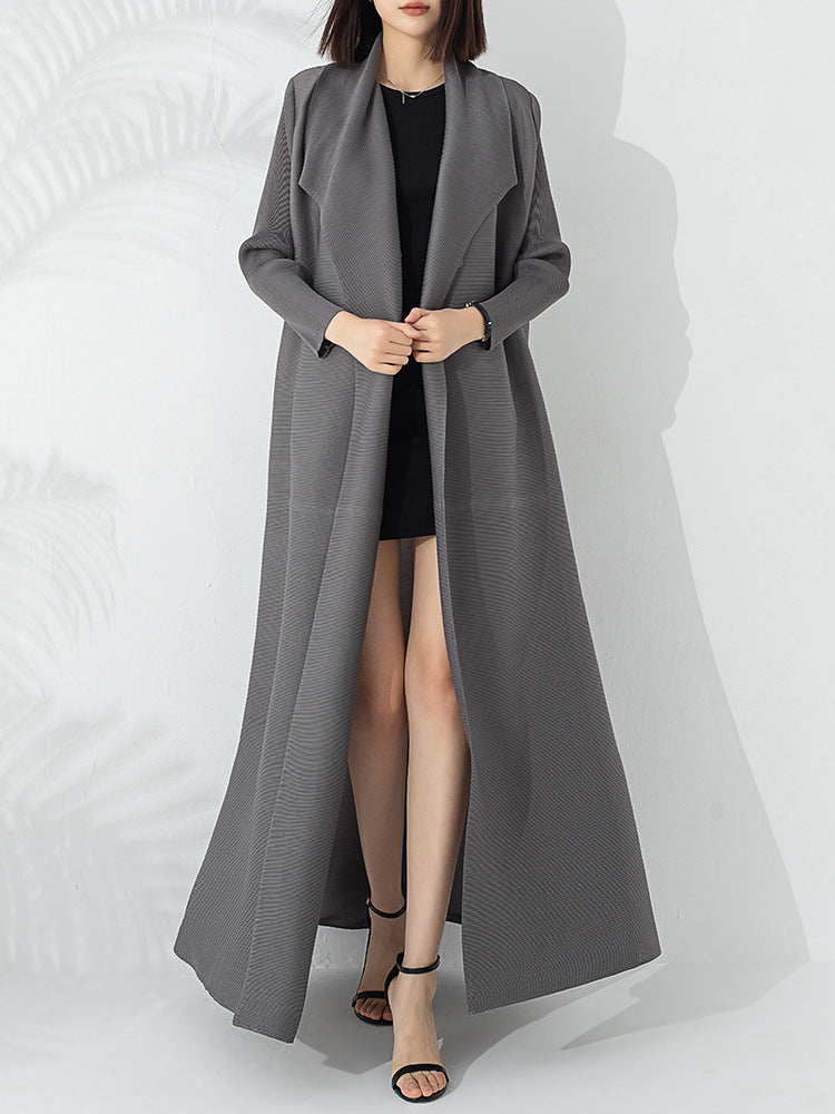 Graceful fashionable long trench coat for women in a classic tailored design