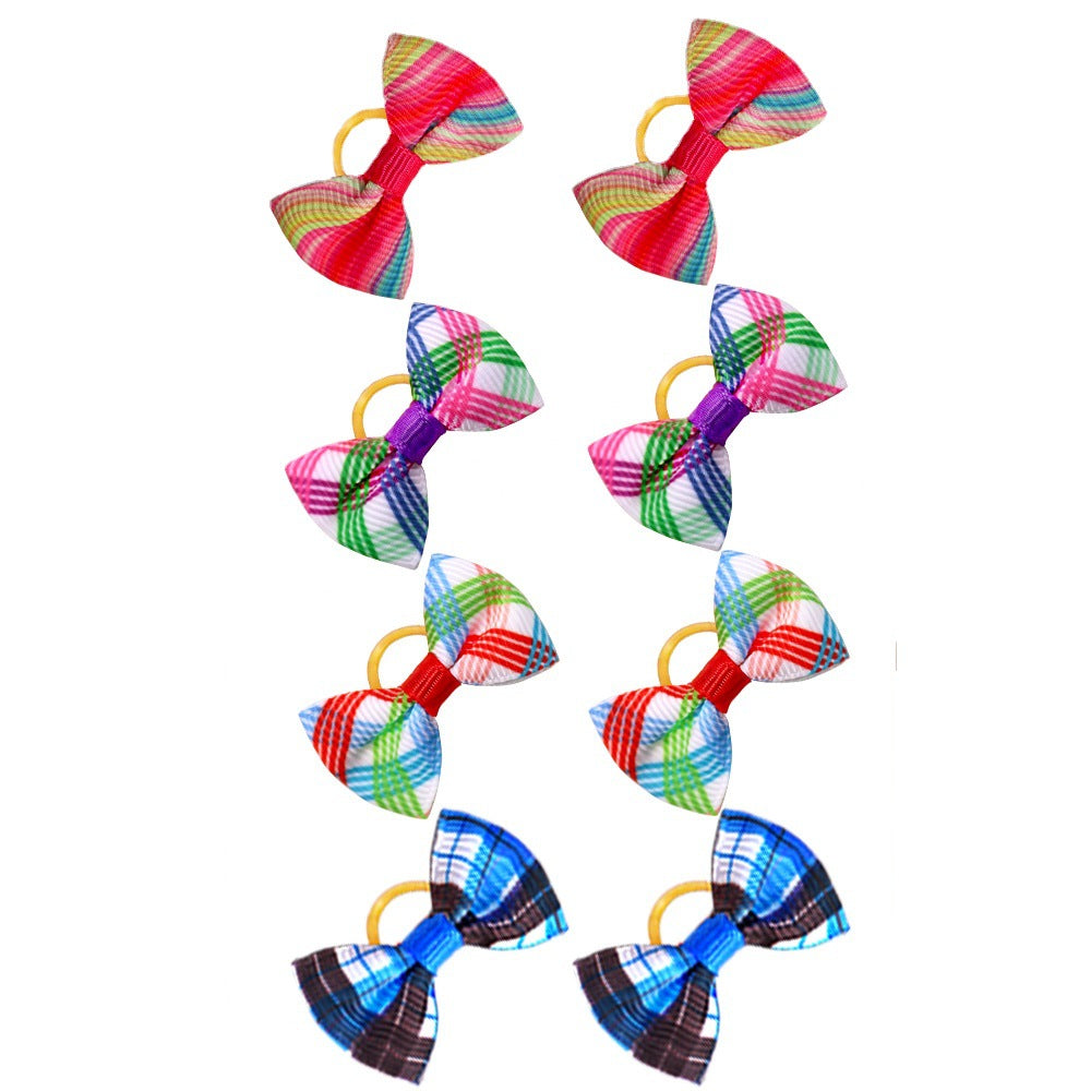 Pet Head plaid bow accessories for pets, colorful patterned bows displayed on a white background