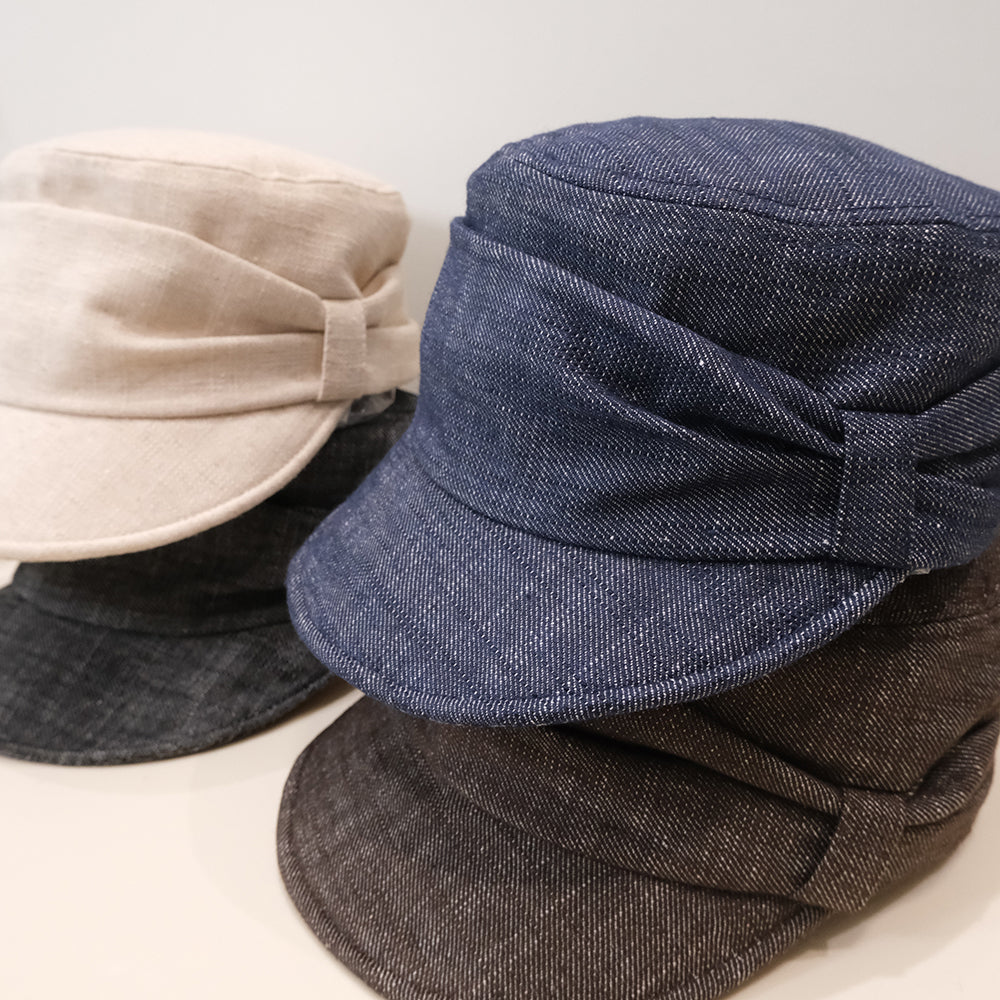 Old money style retro ruffled flat top bowler hat in a classic artistic design