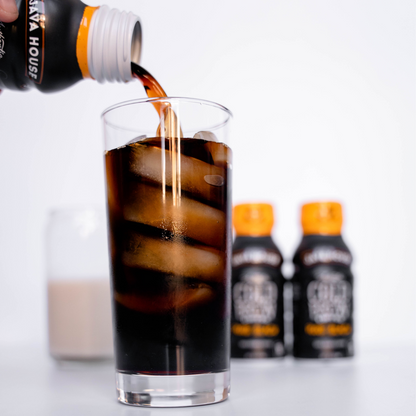 Java House Cold Brew 8oz Bottles in pure black packaging, featuring sleek black coffee bottles with branding and product label