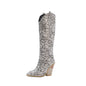 Snake print high heels rider boots with pointed toes and stiletto heels, stylishly designed for a bold fashion statement.