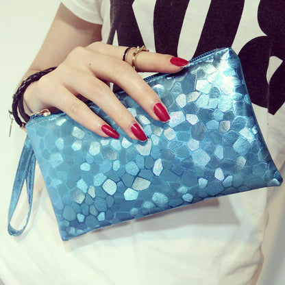 Black women's clutch bag and wallet by BACKUPMYFILESNOW® with gold accents and textured leather finish.