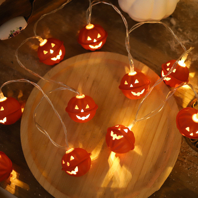 LED Halloween lights string with ghost and pumpkin decorations, festive orange and white lights