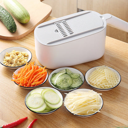 Kitchen vegetable slicer by My Store, compact handheld design for slicing vegetables