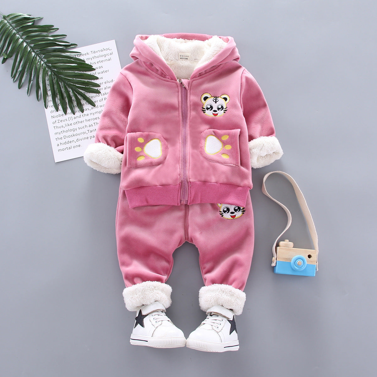 Golden mink plush winter clothing with soft textured fabric and warm winter design
