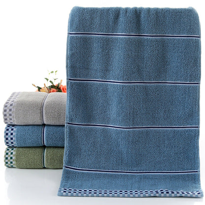 Cotton embroidered towel with detailed stitched design, displayed flat for a clear view
