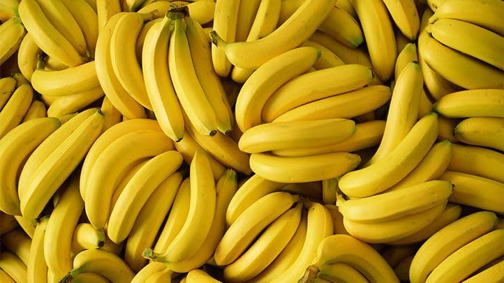Fresh bananas from the Generic brand in an 18.5 lb wholesale produce box, showcasing ripe, yellow bananas ready for sale.