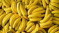 Fresh bananas from the Generic brand in an 18.5 lb wholesale produce box, showcasing ripe, yellow bananas ready for sale.