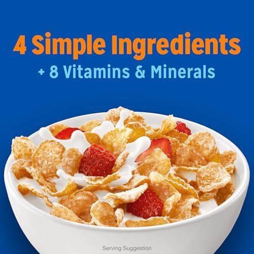 Bowl of Kellogg's Frosted Flakes original giant size cold breakfast cereal in a clear bowl on a table