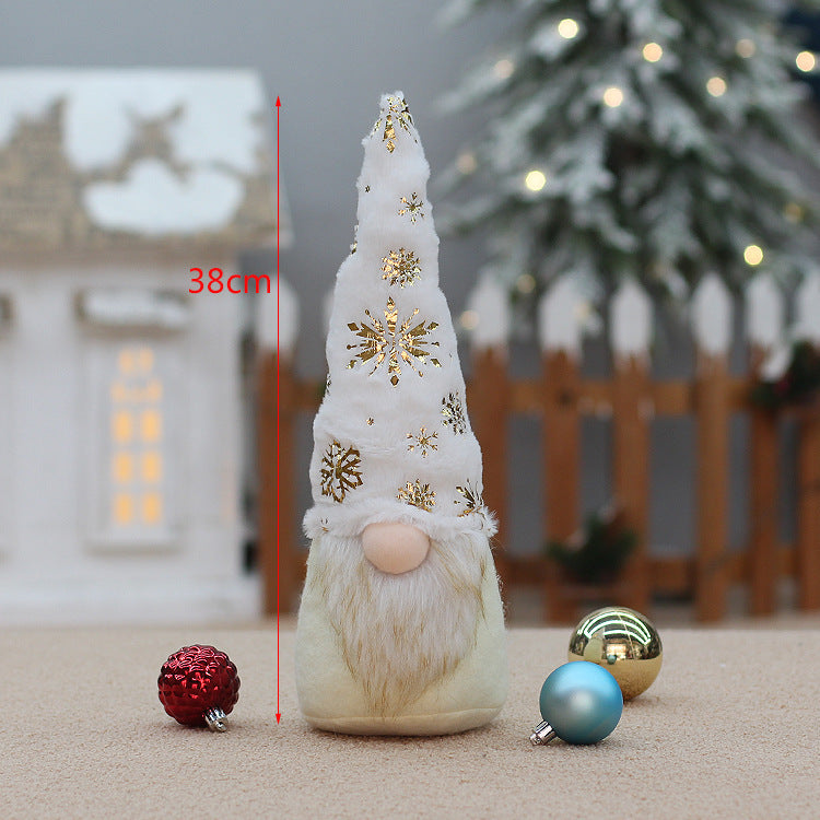 Faceless doll Christmas decorations in festive holiday attire displayed together
