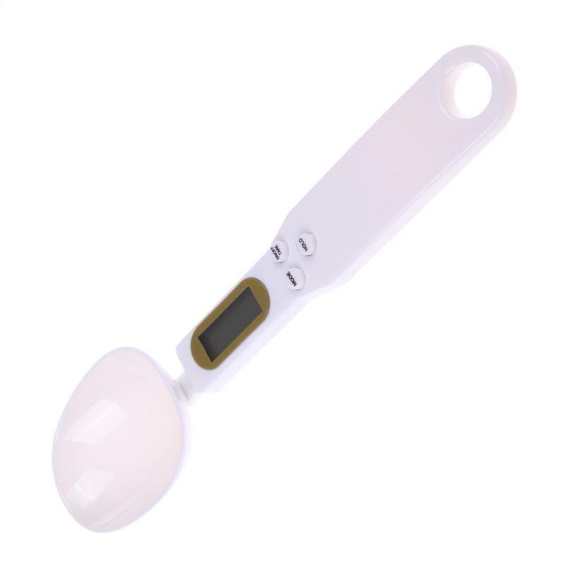 Electronic kitchen scale digital measuring spoon with LCD display, shown in white for precise ingredient weighing