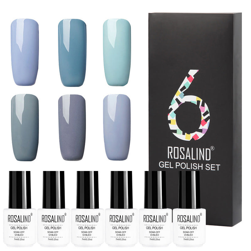 Six-color solid gel polish set in gift box for manicure, assorted nail polish bottles displayed neatly