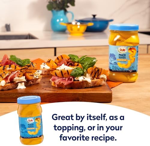 Canned Dole sliced peaches in a jar, 23.5 oz, 8-pack, showing golden peach slices in syrup inside clear jars