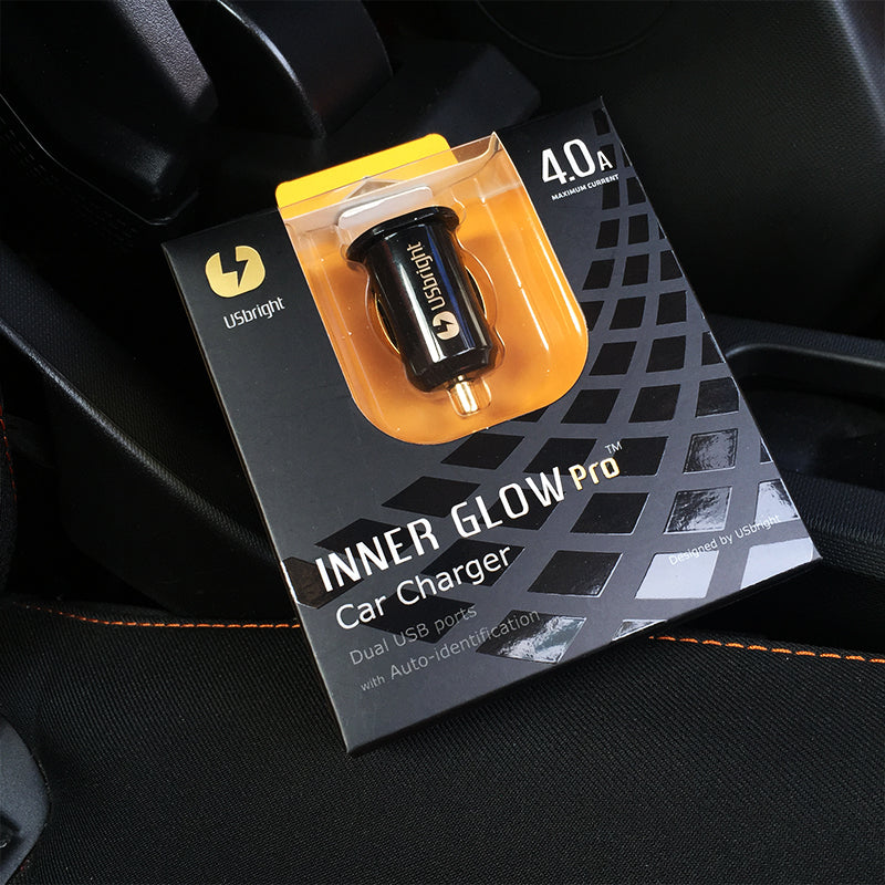 Wireless car charger mounted on a dashboard, compact design with charging cradle for smartphones