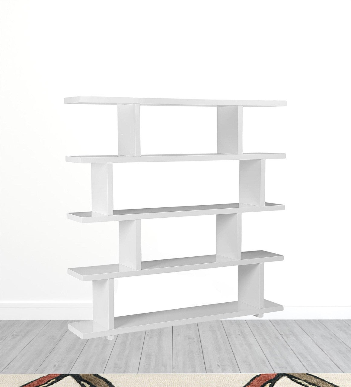White wood five-tier asymmetrical open bookcase with five shelves, designed for stylish storage and display.