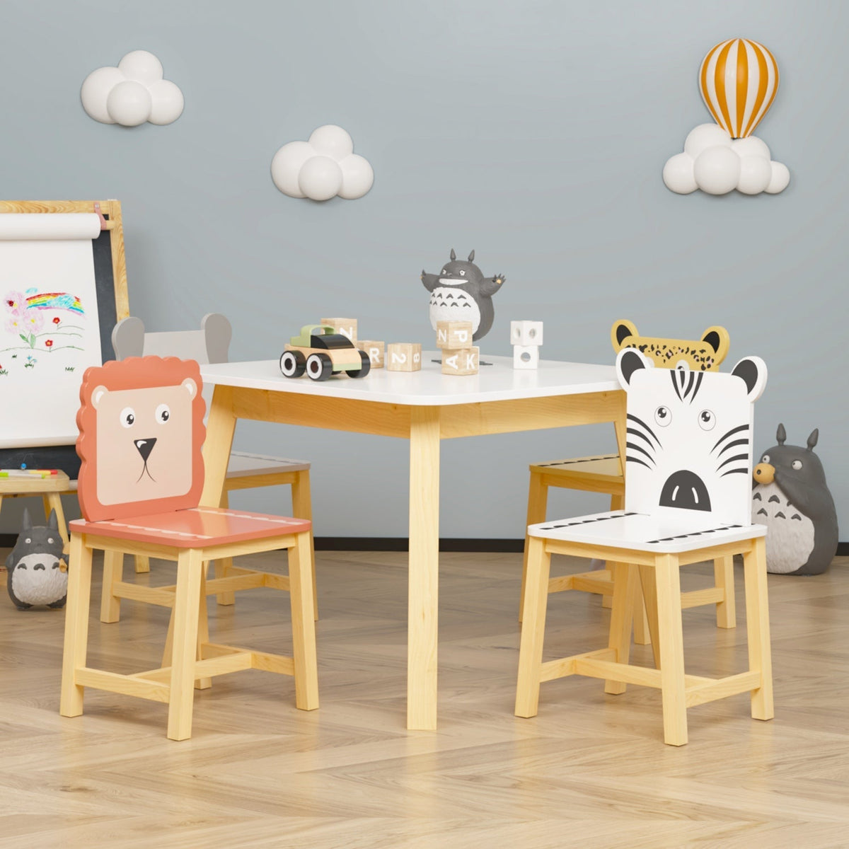 Kids furniture set featuring a table and four chairs with colorful animal designs, perfect for children’s playroom or learning space.