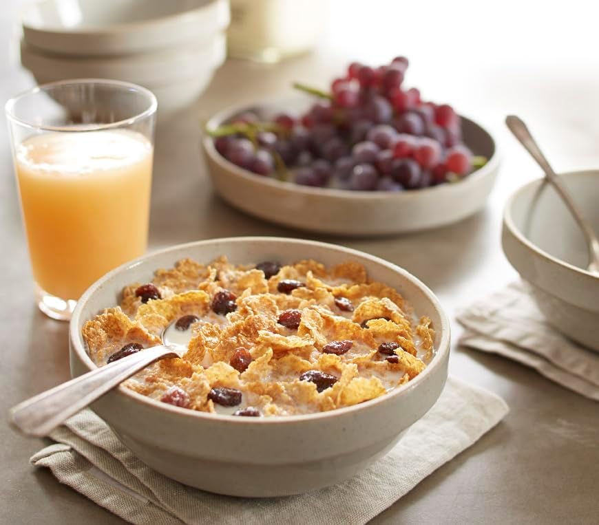 Post Raisin Bran cereal box featuring whole grain wheat, bran flakes, and raisins in a 16.6 oz box.