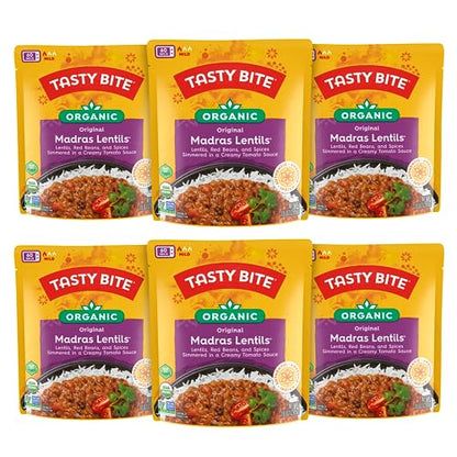 Microwaveable BACKUPMYFILESNOW® Indian Bombay Potatoes entrée in a 10-ounce package, ready to eat with visible potatoes and spices.