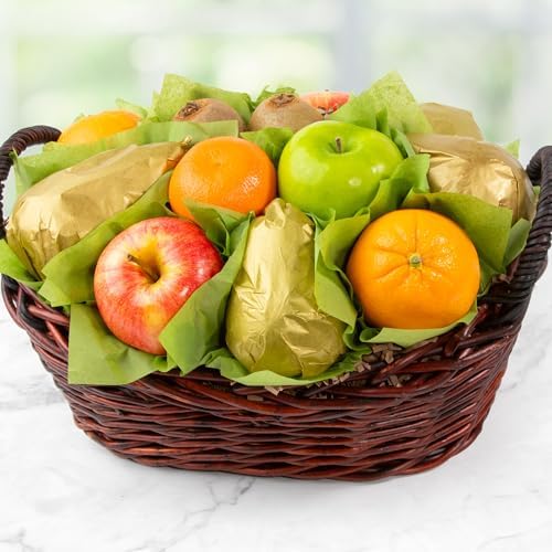 A Gift Inside birthday fruit basket with fresh pears, apples, kiwi, and navel oranges, decorated with a happy birthday ribbon.