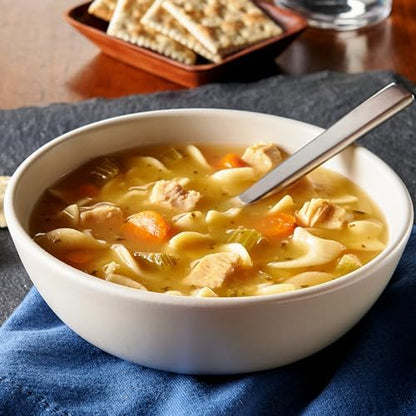 Progresso Traditional Chicken Noodle Canned Soup 19 oz pack, showing four cans with labels and soup ingredients.